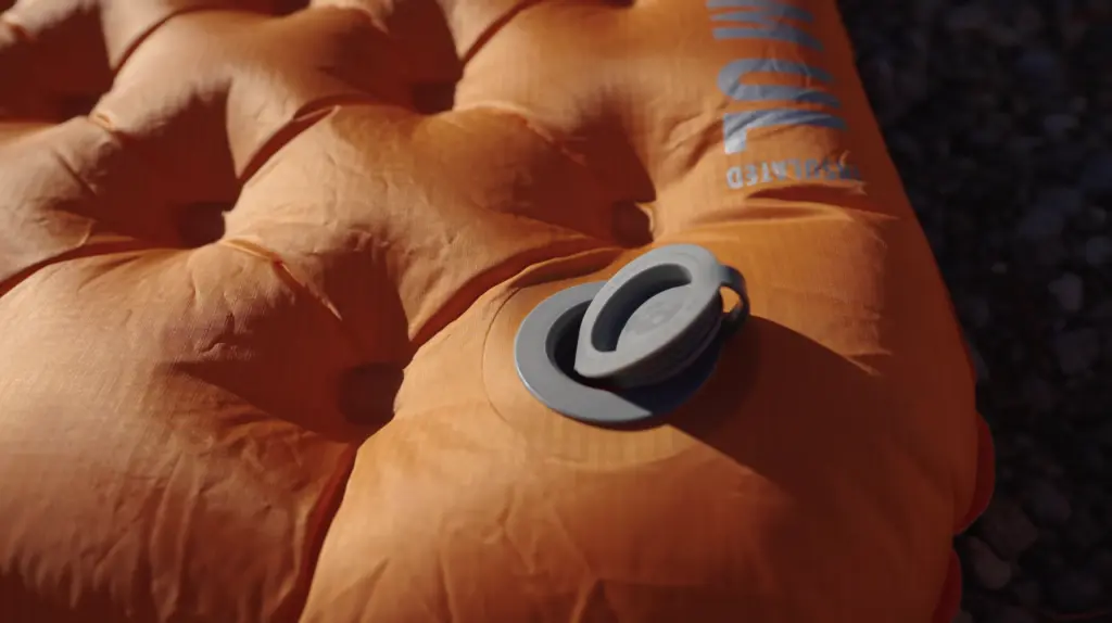Deflating means tucking the cap into the valve, which is slow and may wear the valve over time.