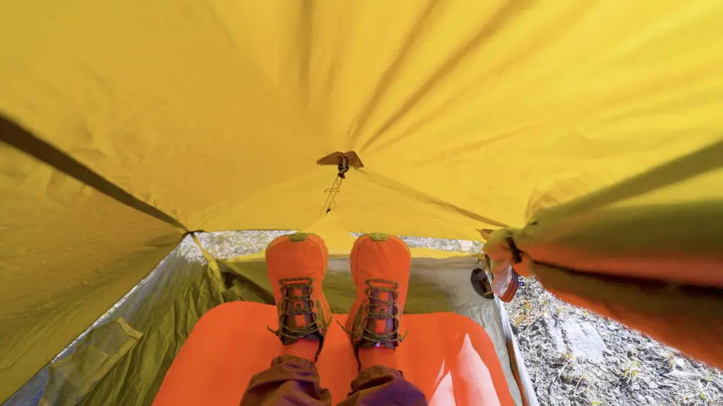 The sloped end walls sit close to the head and feet when lying down.