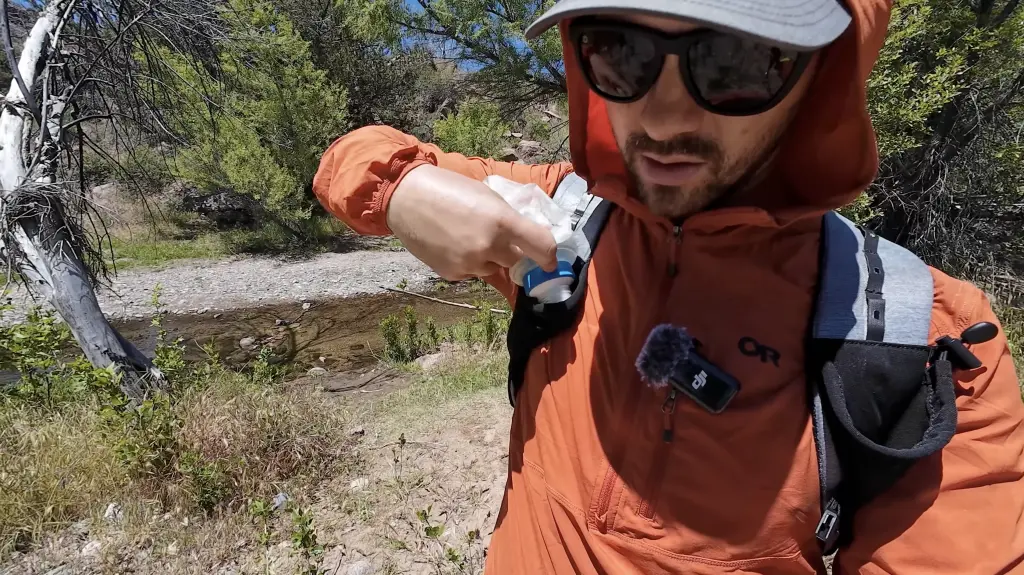 Each shoulder strap has a large stretchy pocket that fits a soft water bottle.